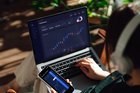 Stocks_Laptop_Phone_Woman